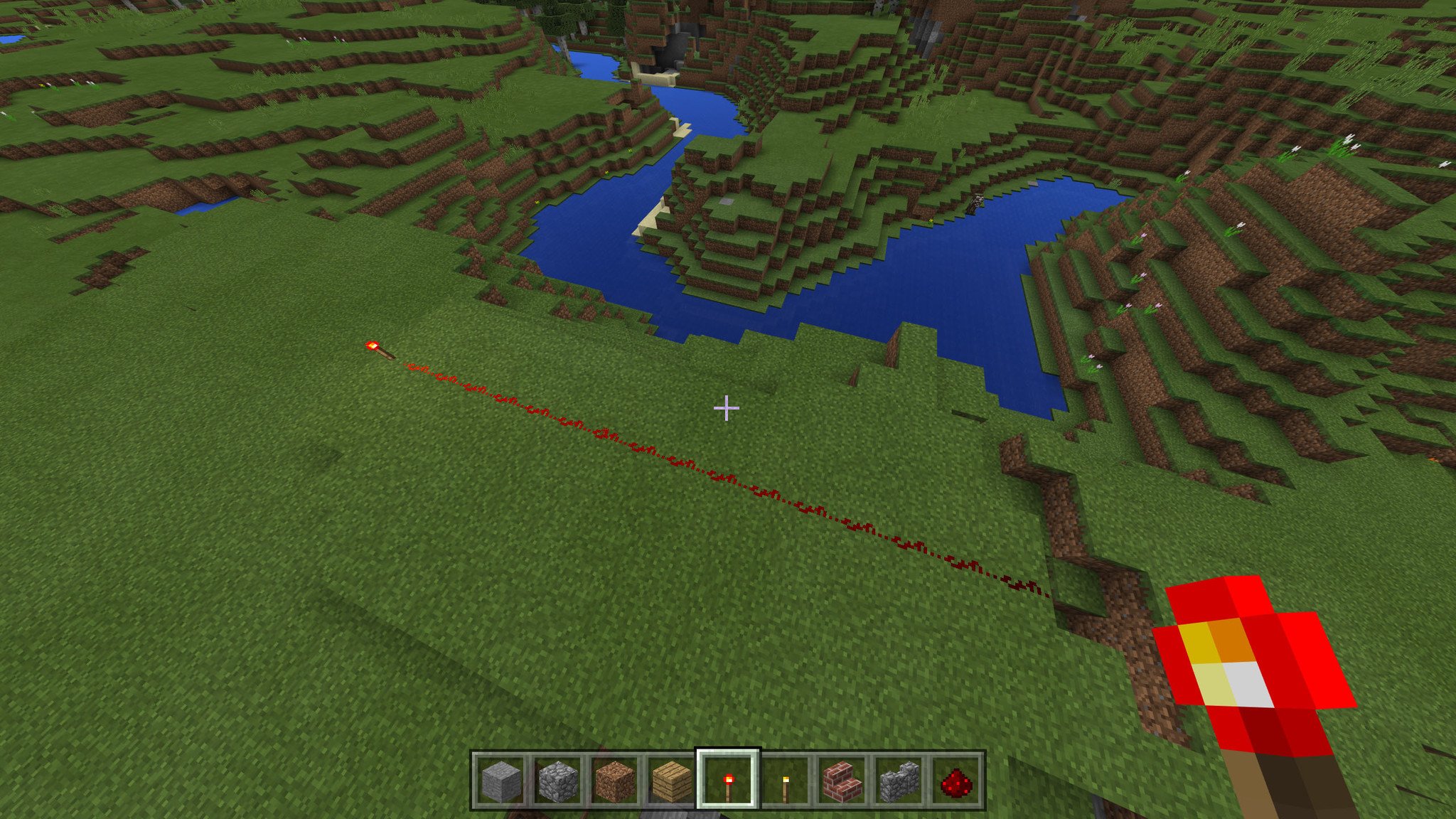 A line of redstone that powers out at 15 blocks.
