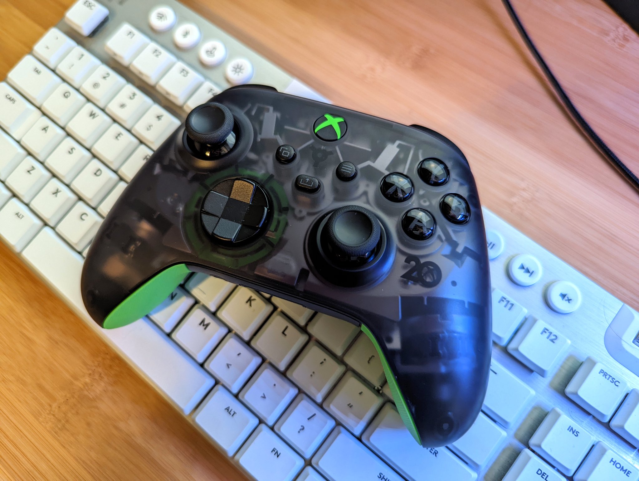 Xbox 20th Anniversary Controller sitting on top of keyboard