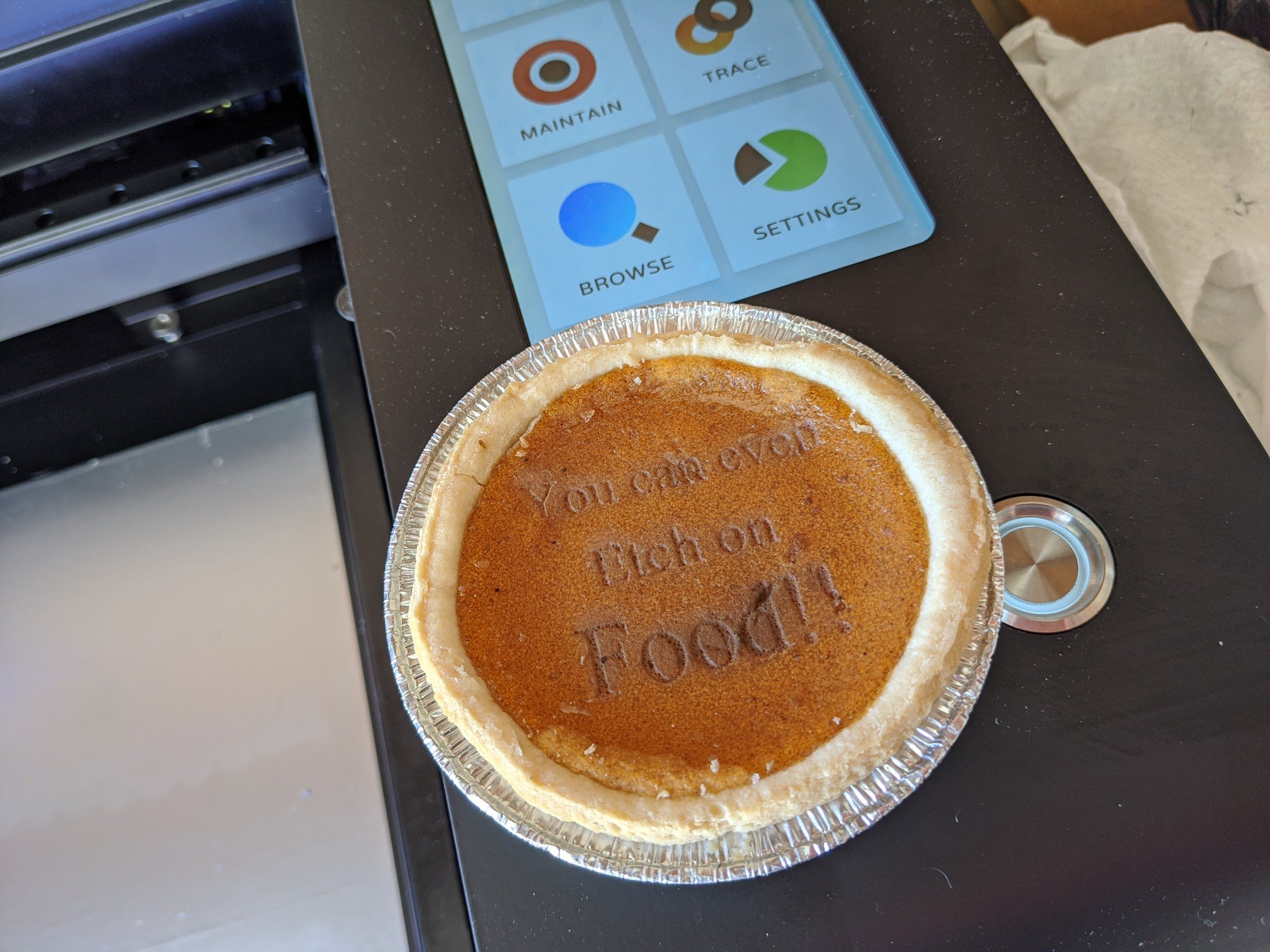 Pumpkin pie with etching on it