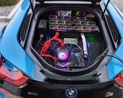 Can't get a GPU? This guy built a mining rig in the back of his BMW i8.